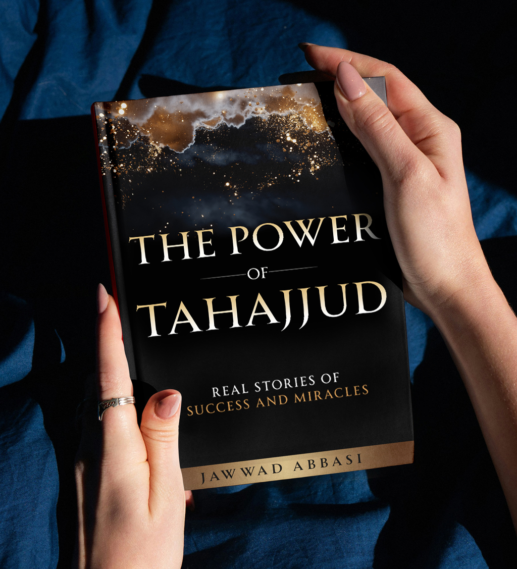 Two hands holding The Power of Tahajjud against dark blue fabric